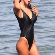 Asena Tugal In A Sexy Black Swimsuit
